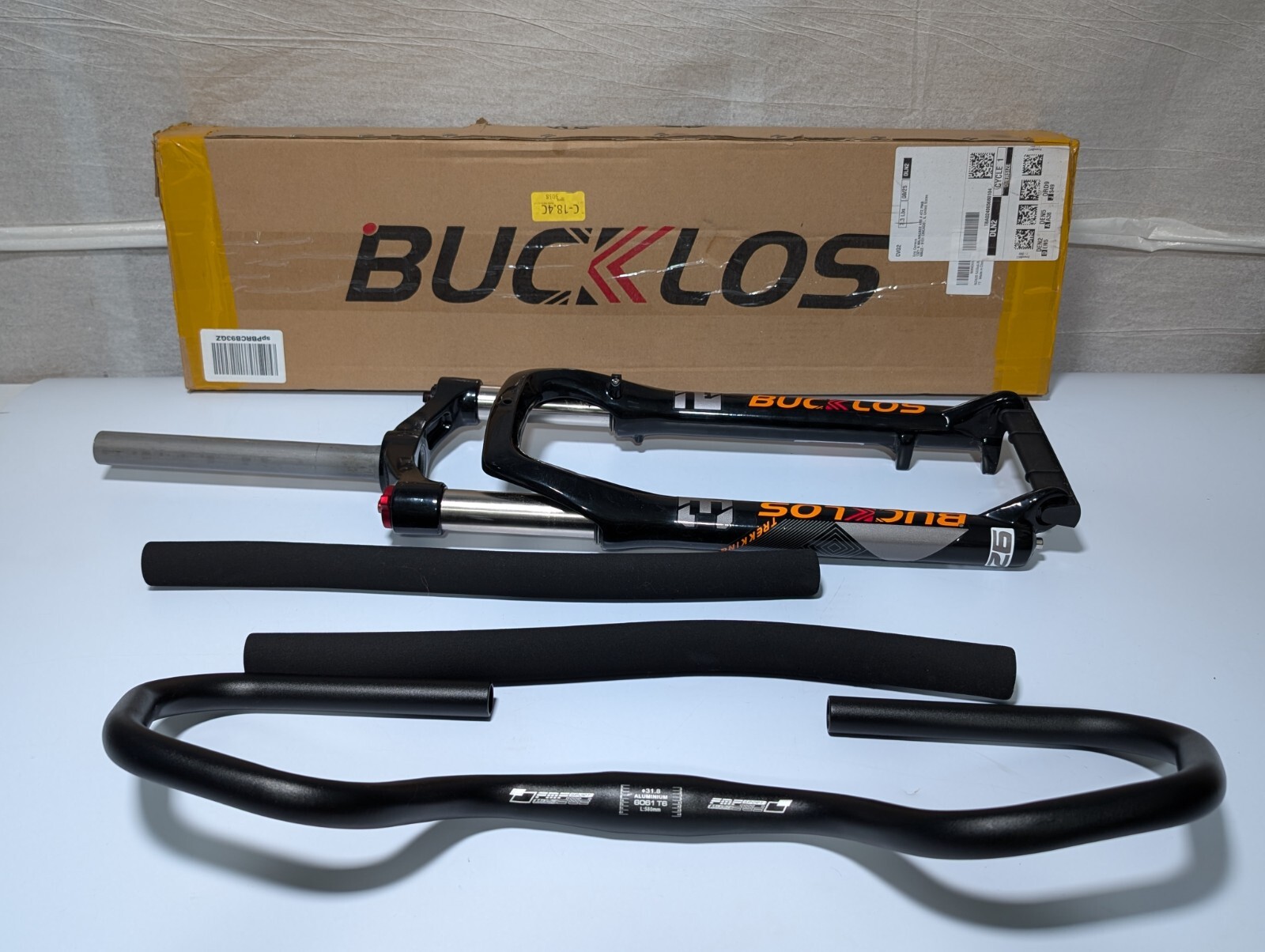 Bucklos 26″ Suspension Fork & FMF Padded Butterfly 31.8″ Handlebars