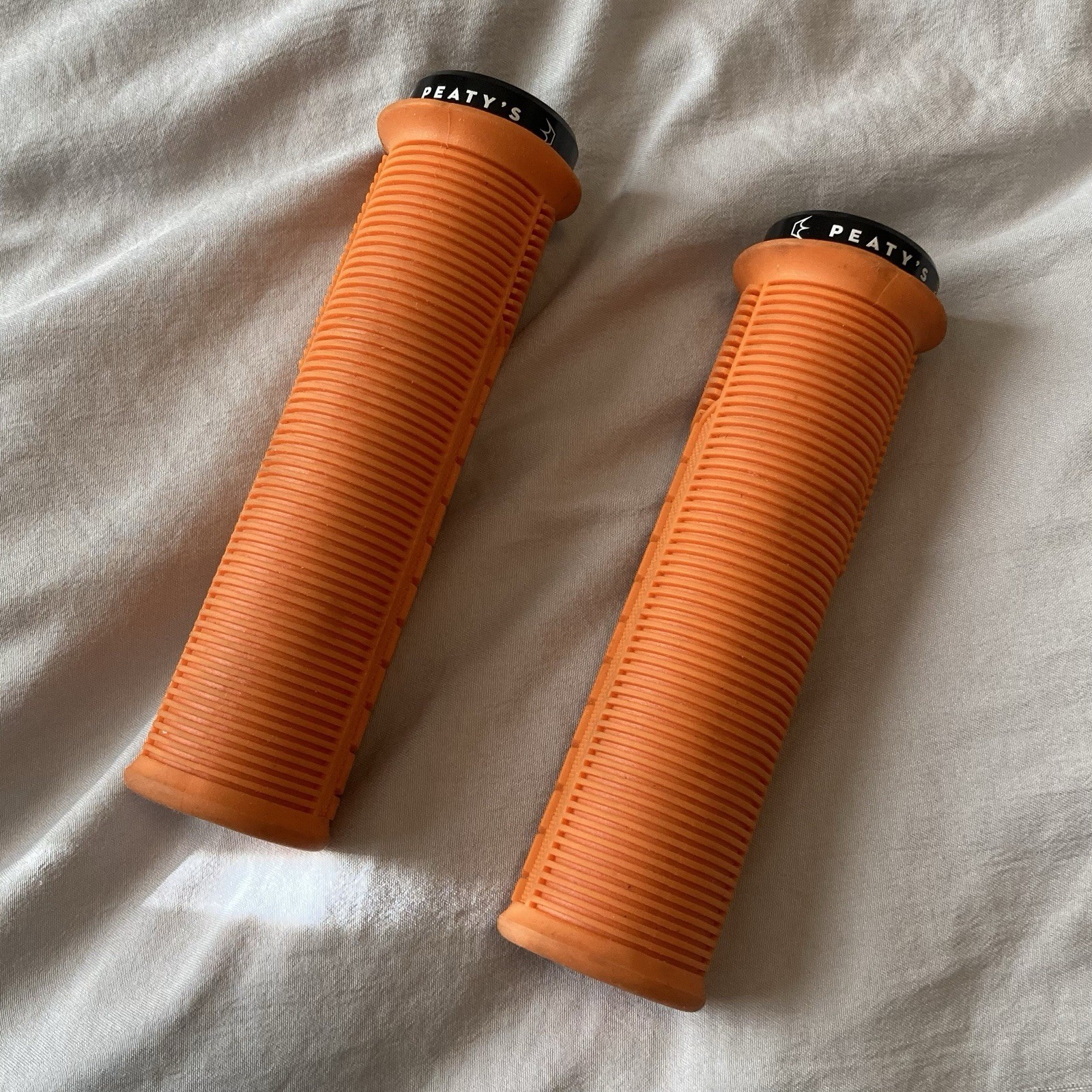 Used Peaty’s Monarch Grips – Mushroom Thick Mango (Orange) 20A Soft Compound
