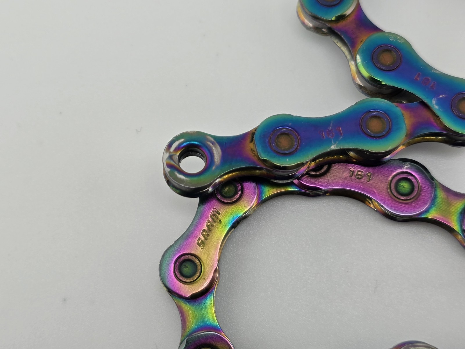 SRAM XX1 Eagle 12-Speed Solid Pin Chain – Rainbow/Oil Slick 117 Links 0.25% Wear