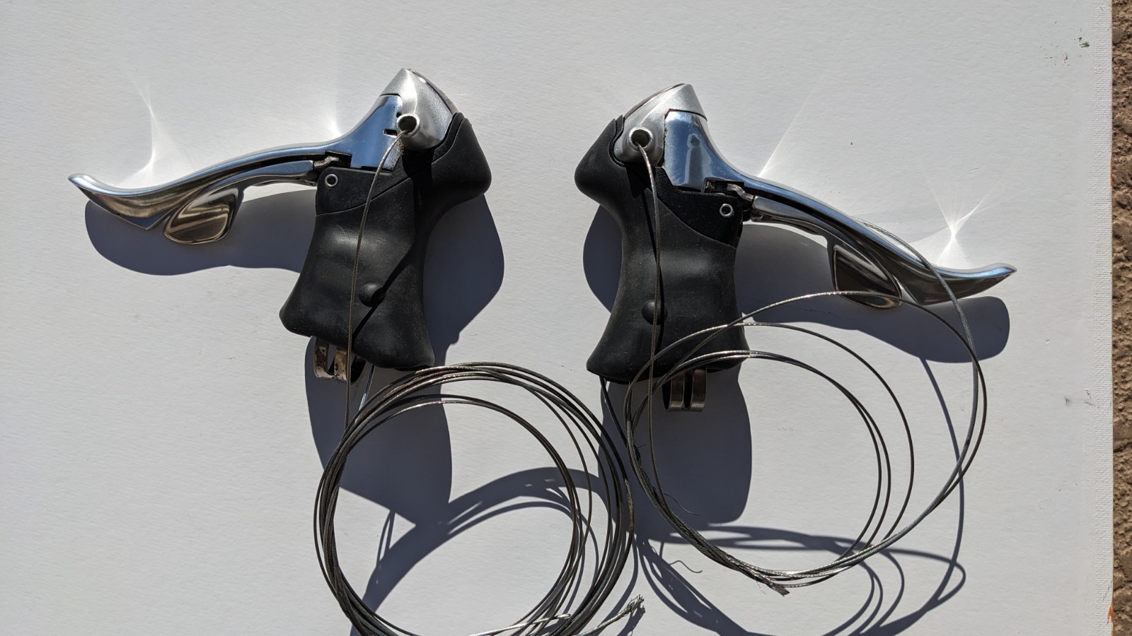 Shimano Dura-Ace ST-7700-C; 2 x 9 STI Shifters/Brifters