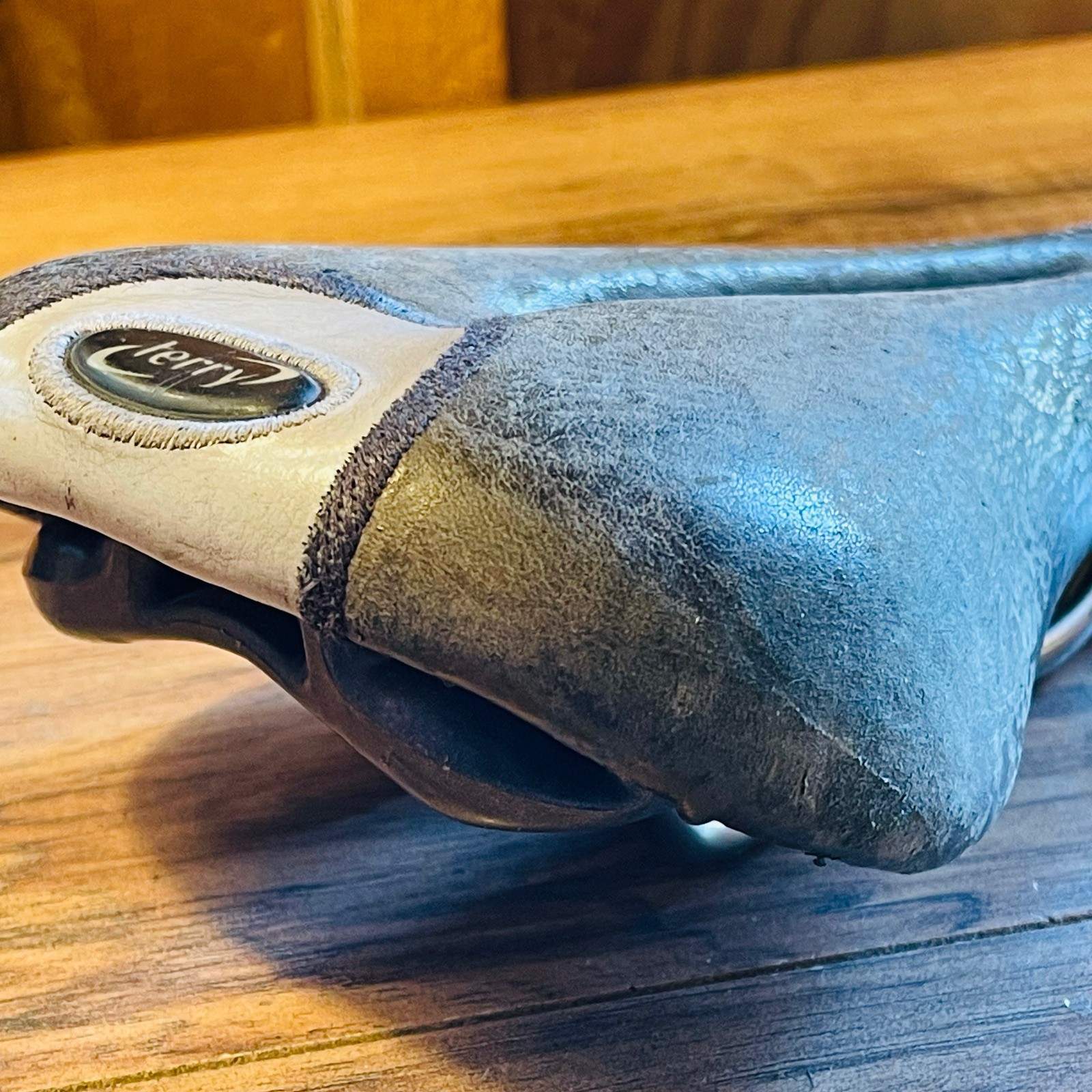 Terry  Cutaway Saddle Gray Leather Titanium Rails