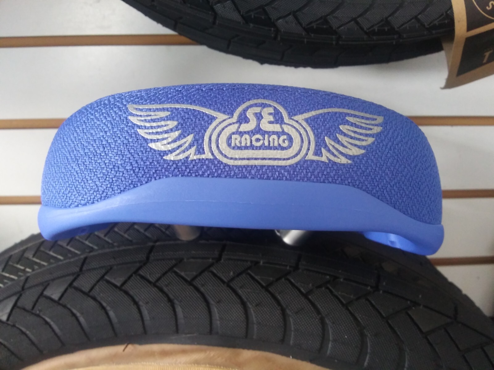 S.E flyer seat and ODI longneck grips with end caps in blue
