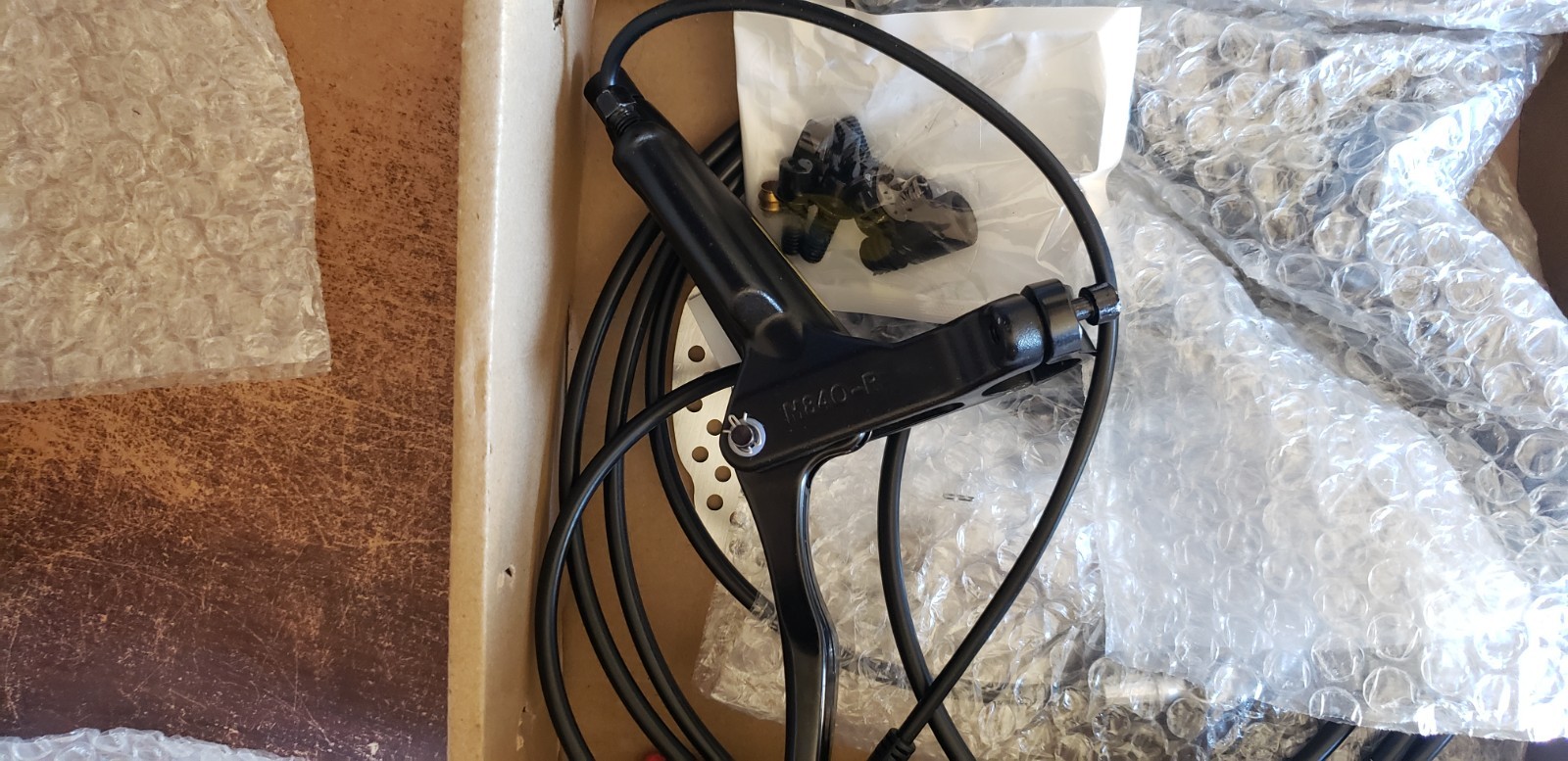 ZTZ eBIKE HYDRAULIC BRAKE SET IN AN OPEN BOX