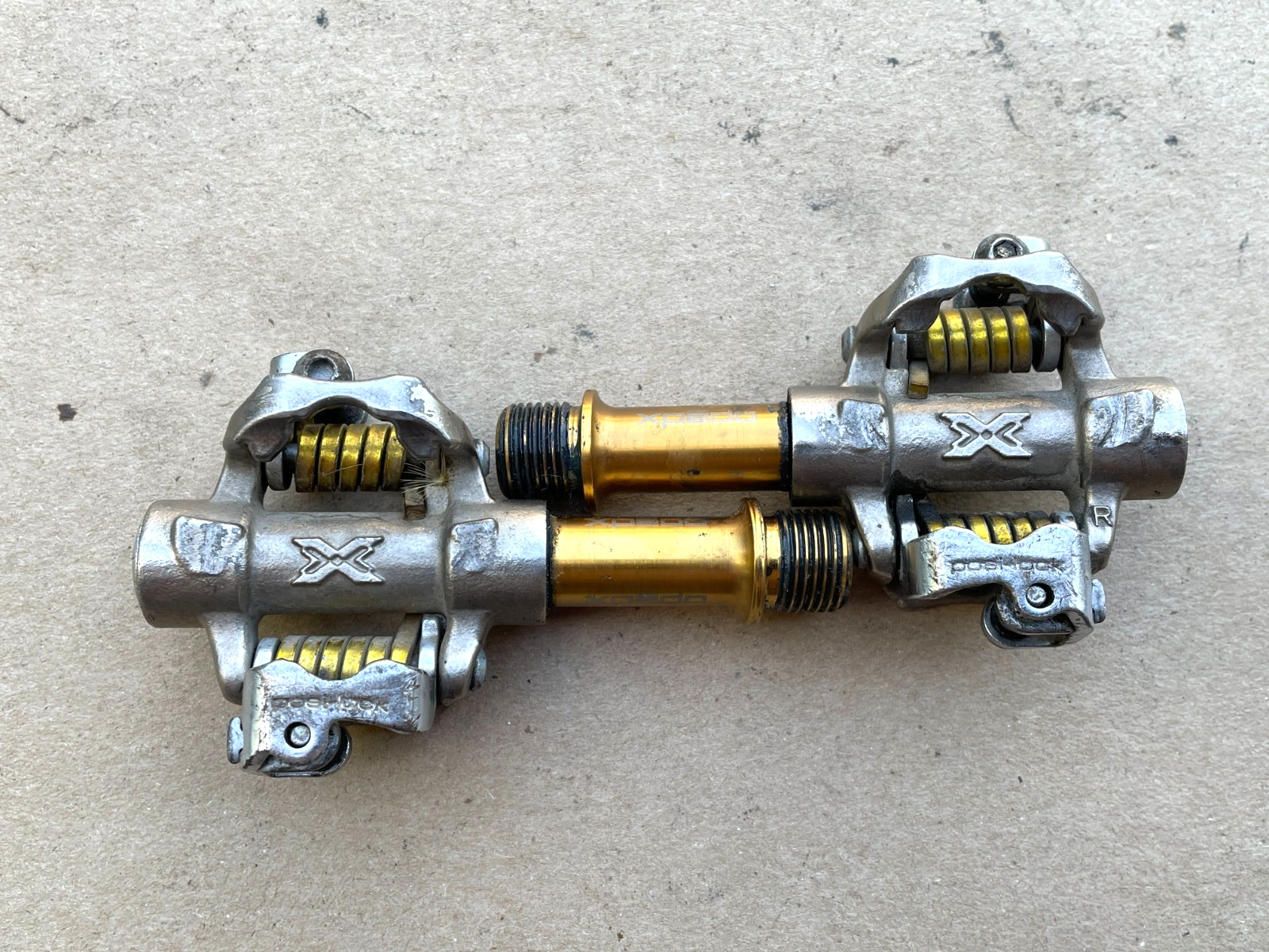 Xpedo «posi-lock» clipless pedals Silver/Gold
