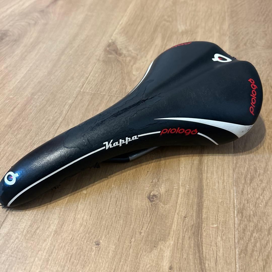 Prologo Kappa Black Red Saddle Used with Scratches Plastic Metal Frame