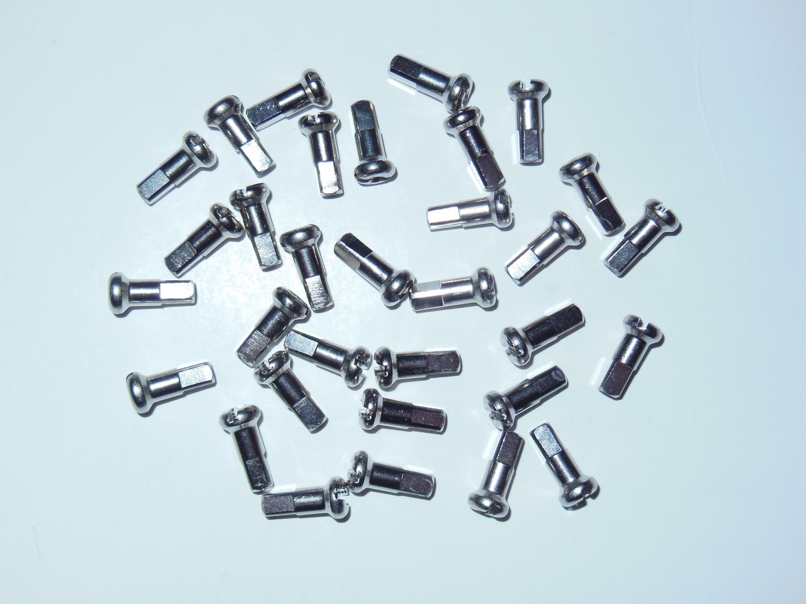 New DT Swiss 2.0 x 12mm Brass Spoke Nipples 32-piece 14 gauge nickel/silver tone