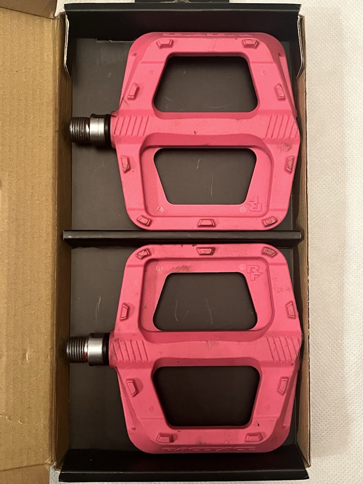 Race Face Ride Flat/Platform Pedals Pink 9/16in Nylon Composite Steel Bushing