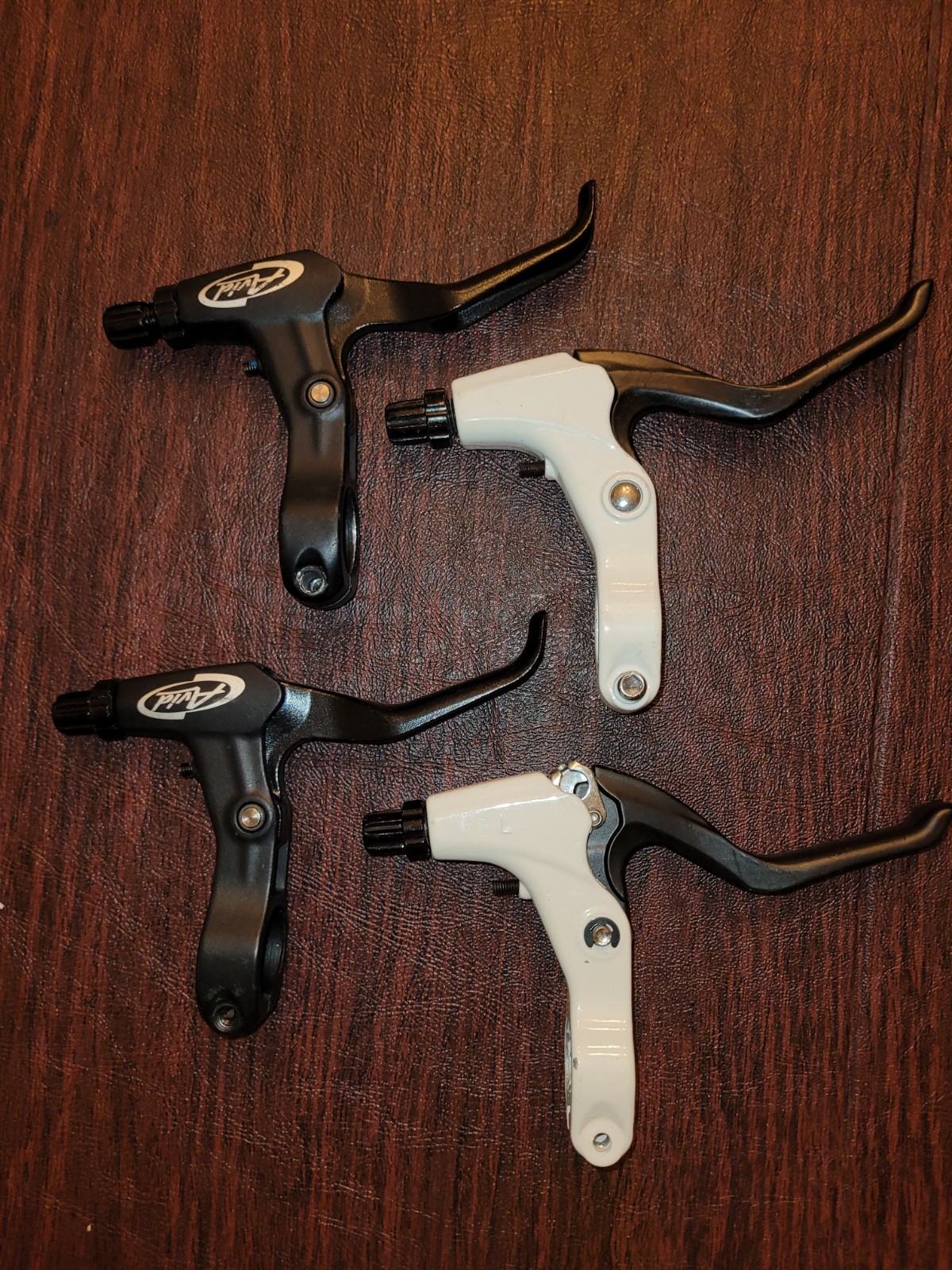 1 Pair FR-5 BLACK Brake Levers & 1 Pair of Unbranded White Brake Levels.