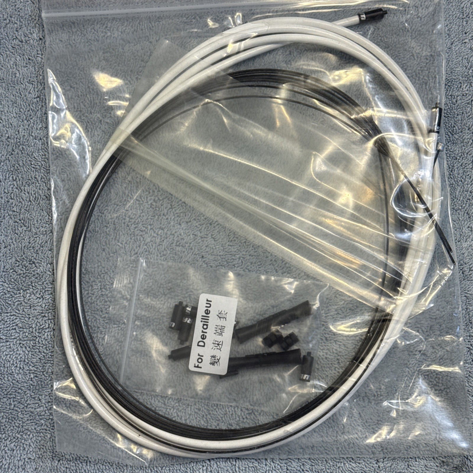 SRAM SlickWire Shift Cable and Housing Kit – Road/MTB, 4mm, White [ssg]